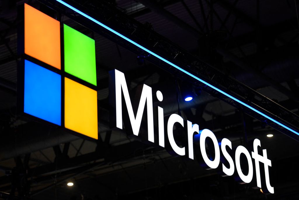In The Year  On March 2, 2022, The Microsoft Logo Was Unveiled At The Mwc (Mobile World Congress) In Barcelona.  - Mobile World Congress, Where Smartphone And Telecom Companies Showcase Their Latest Products And Share Their Strategic Vision, Is Expected To Welcome More Than 40,000 Guests.  Guests During The Four-Day Run.  (Photo By Josep Lago/Afp) (Photo By Josep Lago/Afp Via Getty Images)