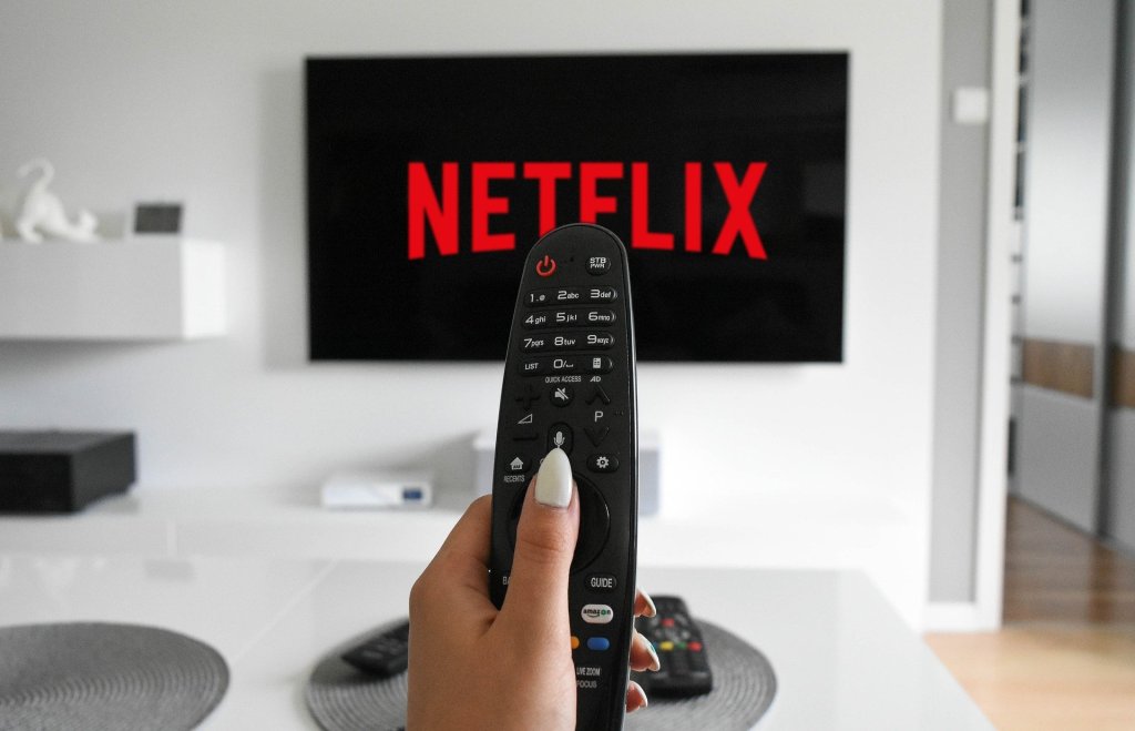 remote control pointed at Netflix screen