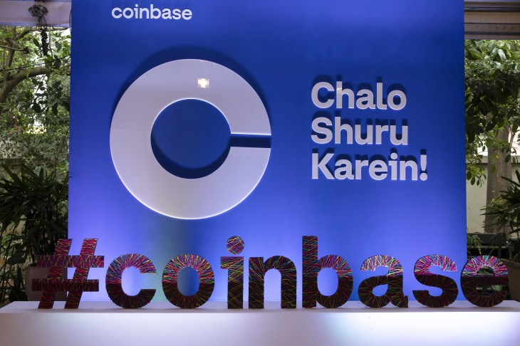 Signage at a Coinbase Global Inc. event.