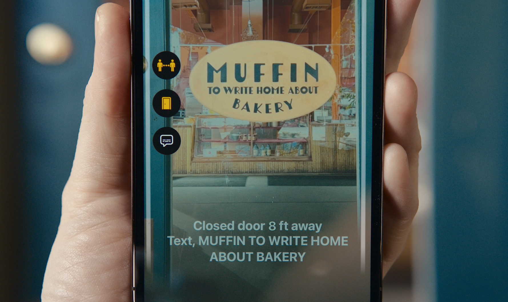 Image of a phone showing information about a door it sees: "Muffin to write home about bakery"