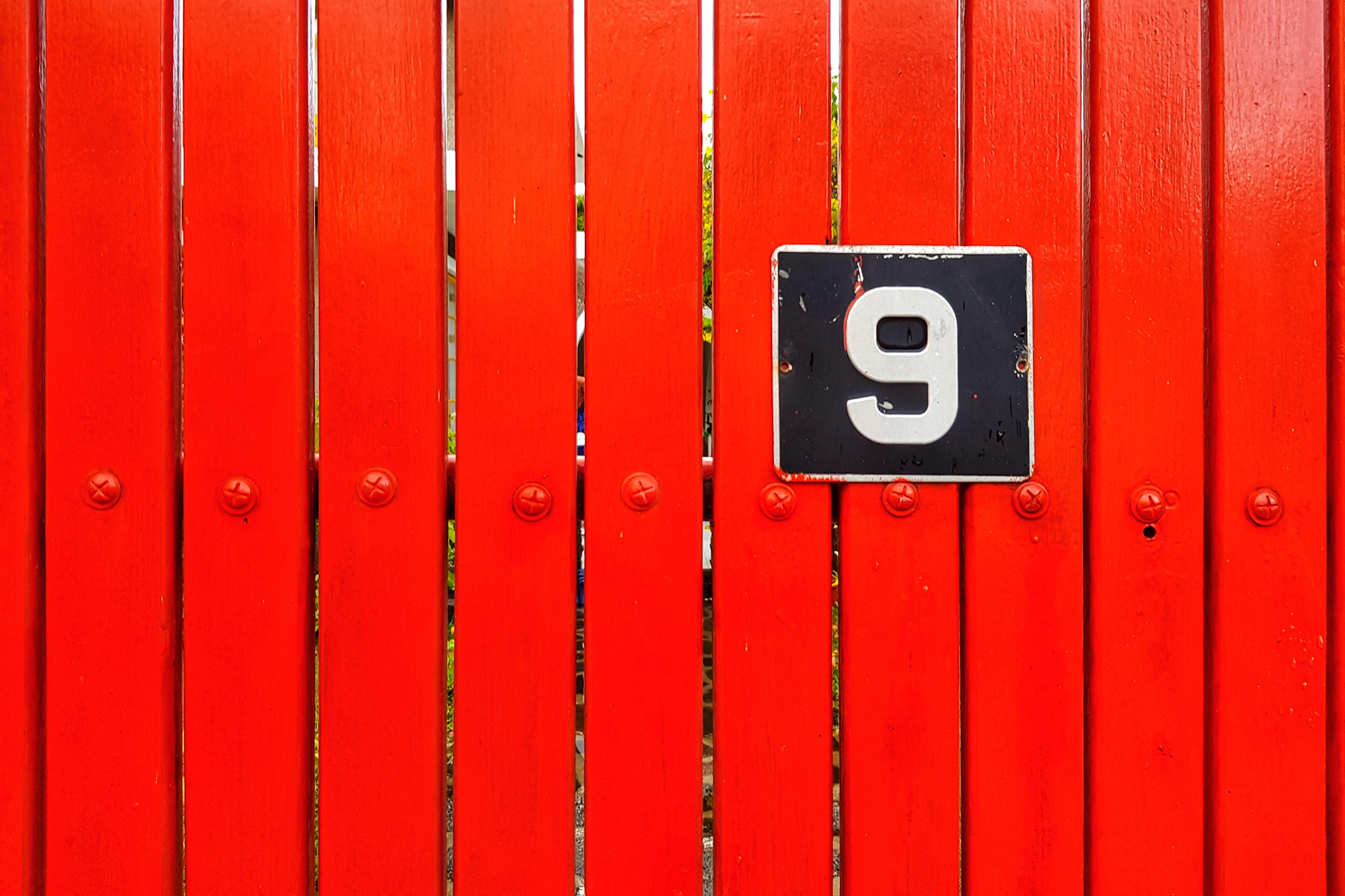Number 9 On Red Wall