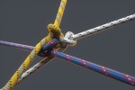 Image of colored ropes tied into knots.