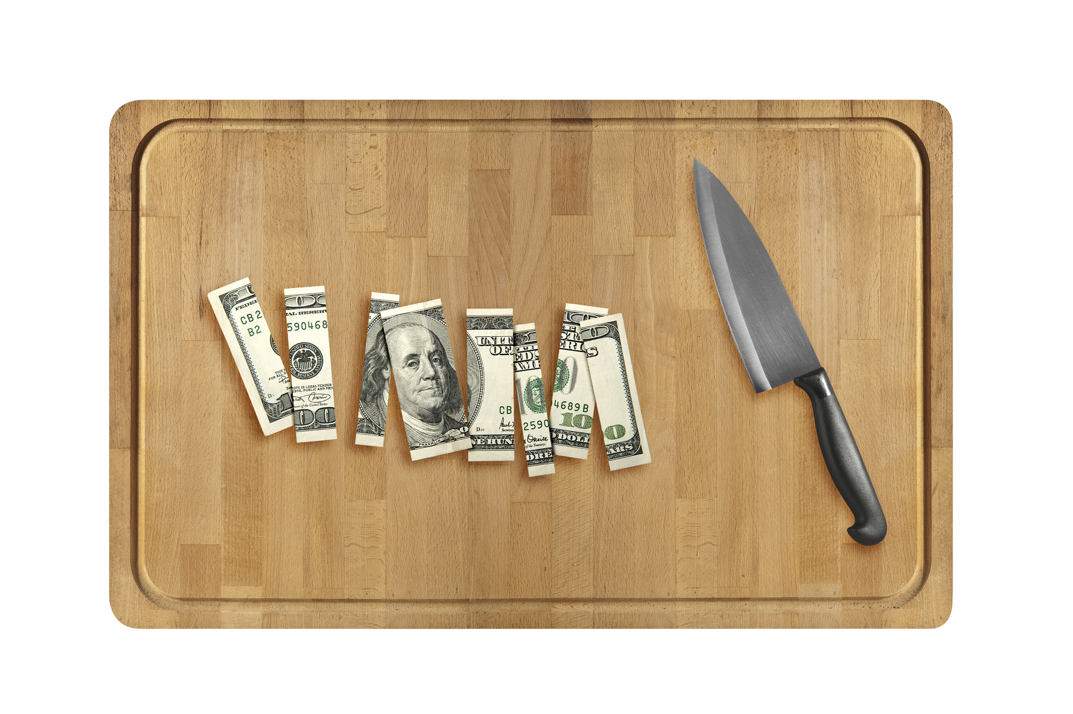 Knife and cut one hundred dollars on a wooden cutting board.  isolated on white background.