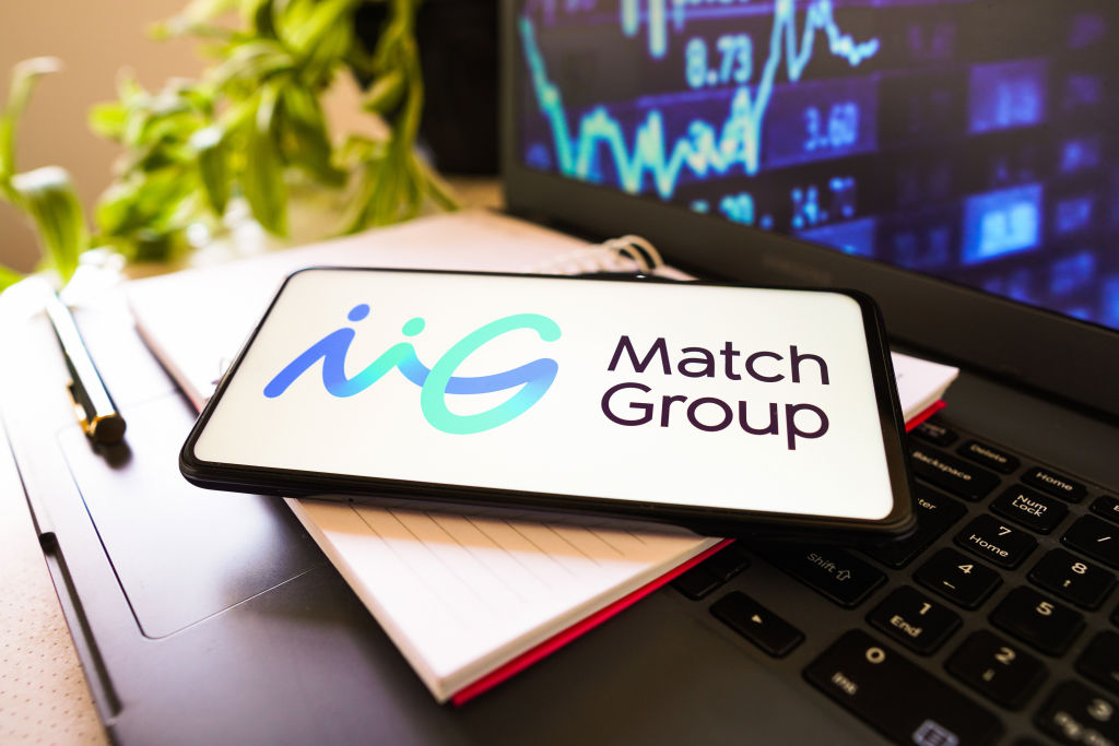 The Match Group Inc. logo is displayed on a smartphone screen.