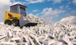 yellow bulldozer making its way through piles of dollars. 3d render. wealth concept