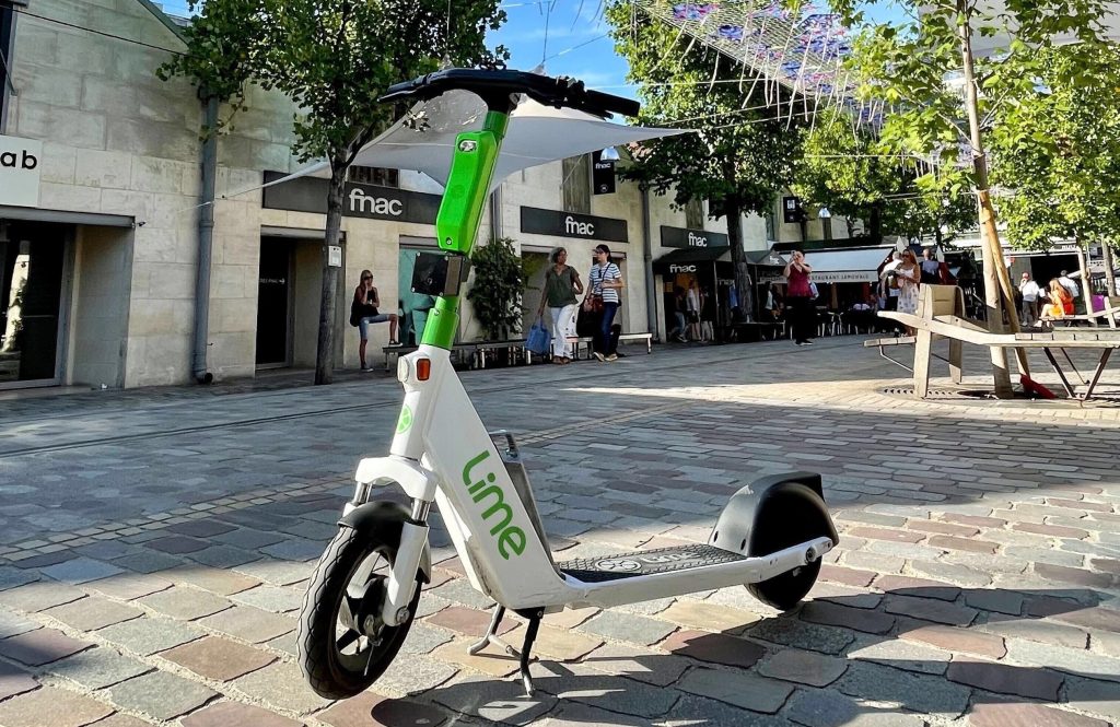 Lime scooter with computer vision system, including camera, attached to the neck