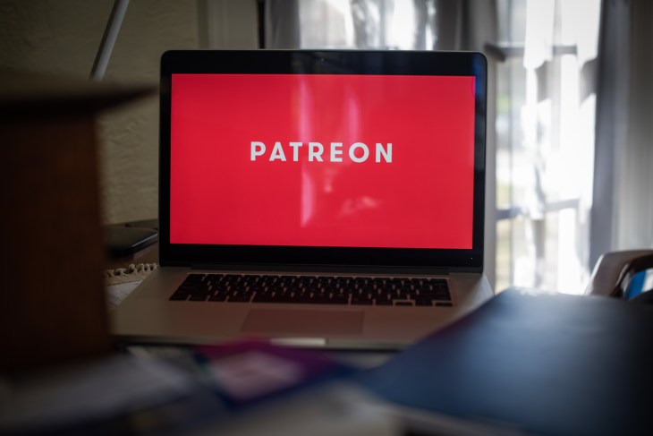 The Patreon Inc. logo on a laptop computer arranged in Dobbs Ferry, New York, U.S., on Tuesday, April 13, 2021. More than 200,000 artists and entertainers use Patreon Inc. to connect with and raise money from fans. That momentum has helped the company raise some money of its own. Photographer: Tiffany Hagler-Geard/Bloomberg via Getty Images