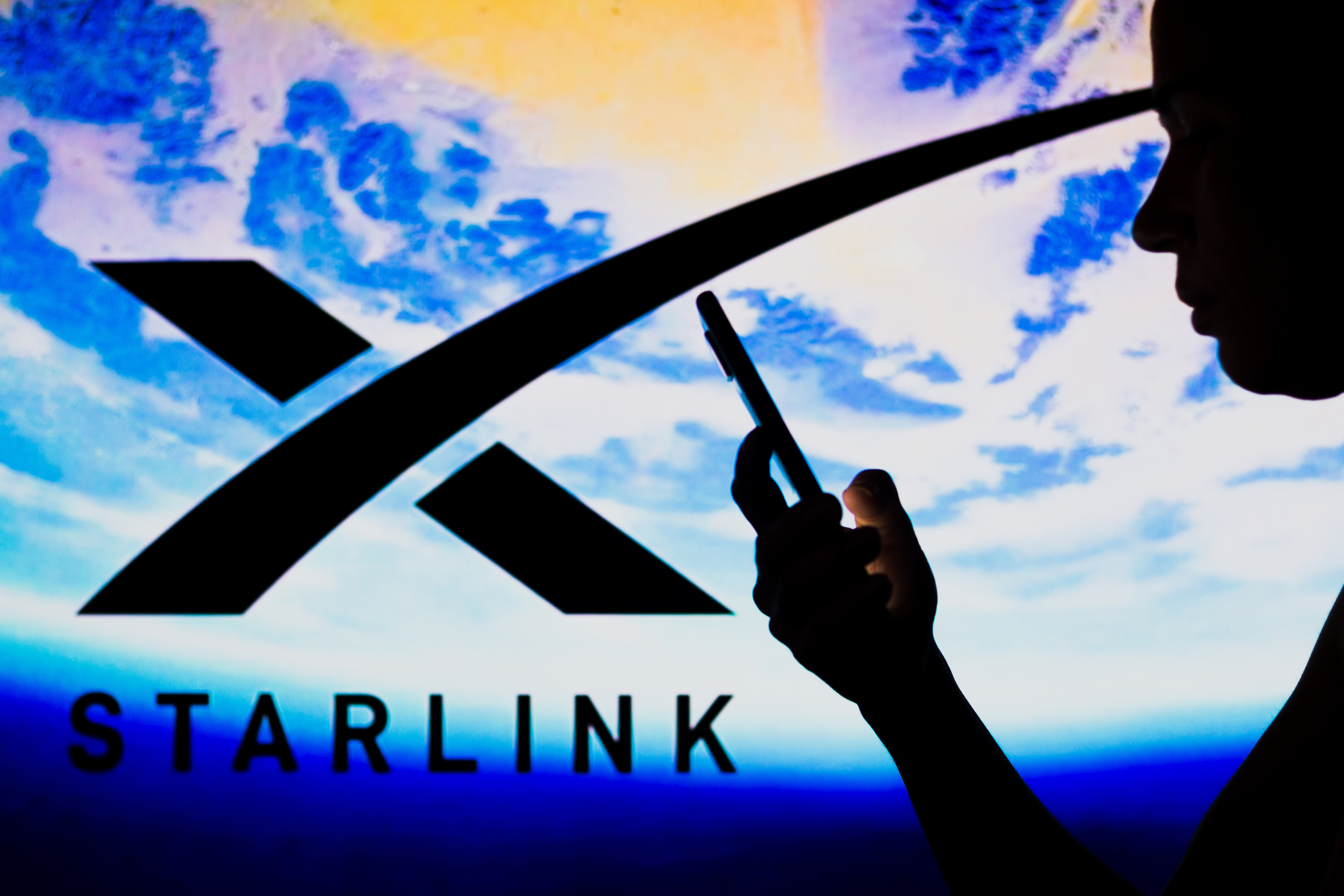 Dalam ilustrasi foto ini, logo Starlink ditampilkan