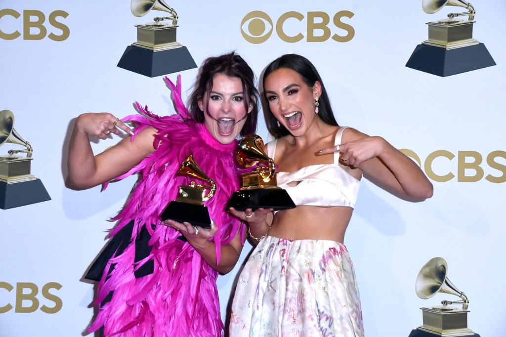 Abigail Barlow and Emily Bear pose with their Grammy awards after winning best musical album for the unofficial bridgerton musical