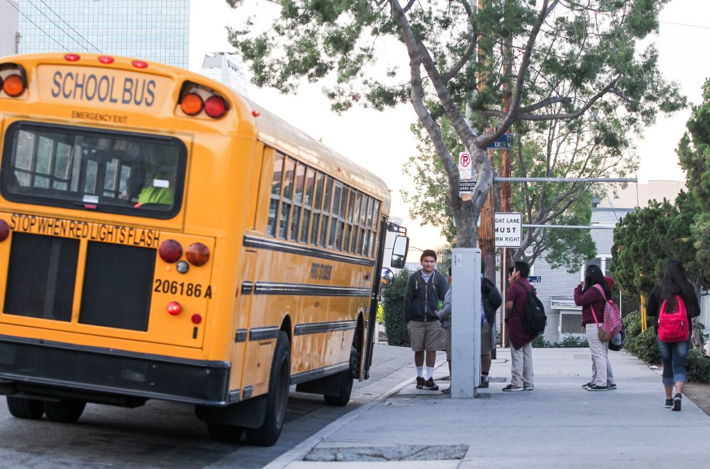 A Los Angeles school district bus picking up children.