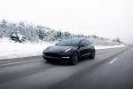 Tesla Model 3 on road in winter