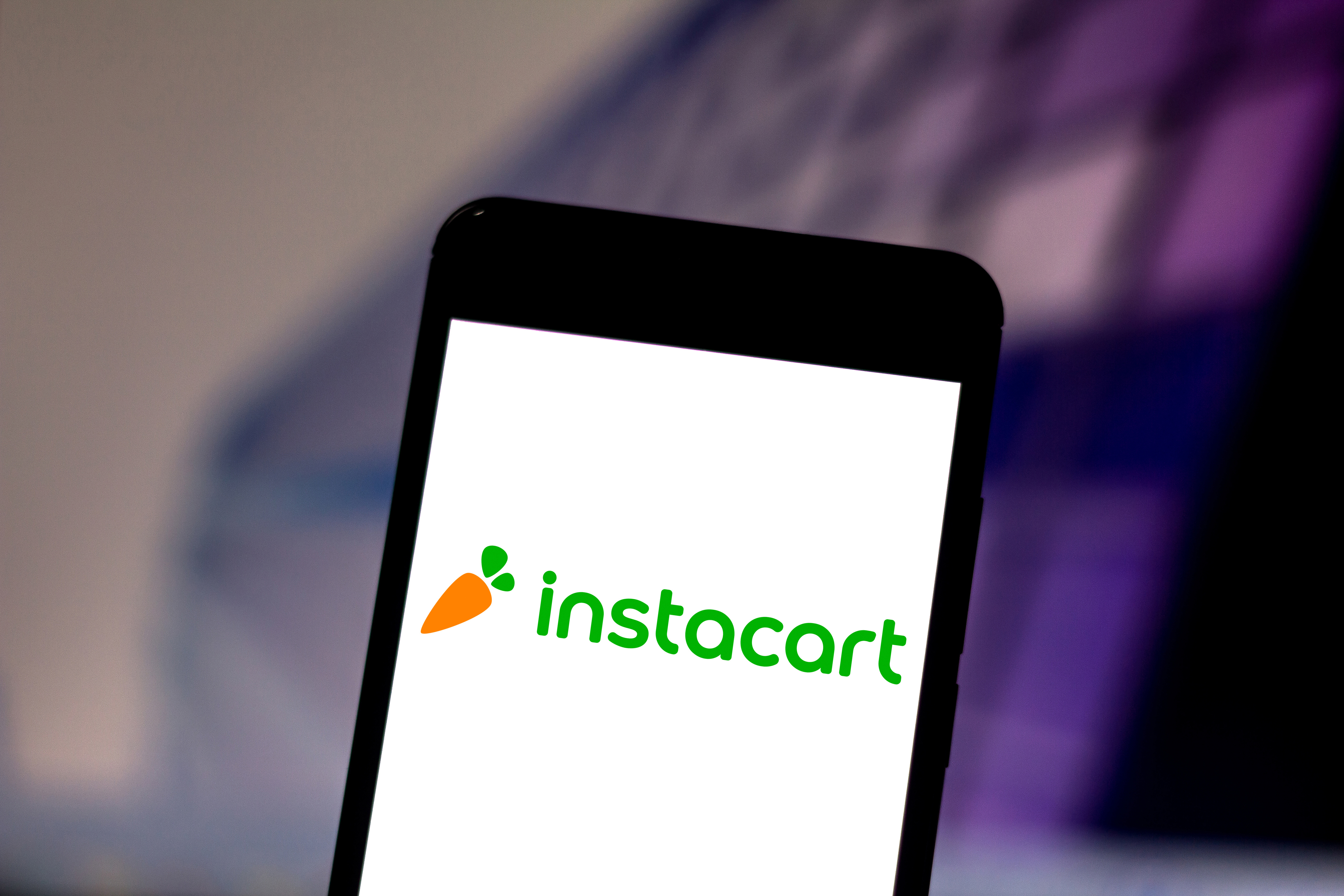 Instacart logo on a phone