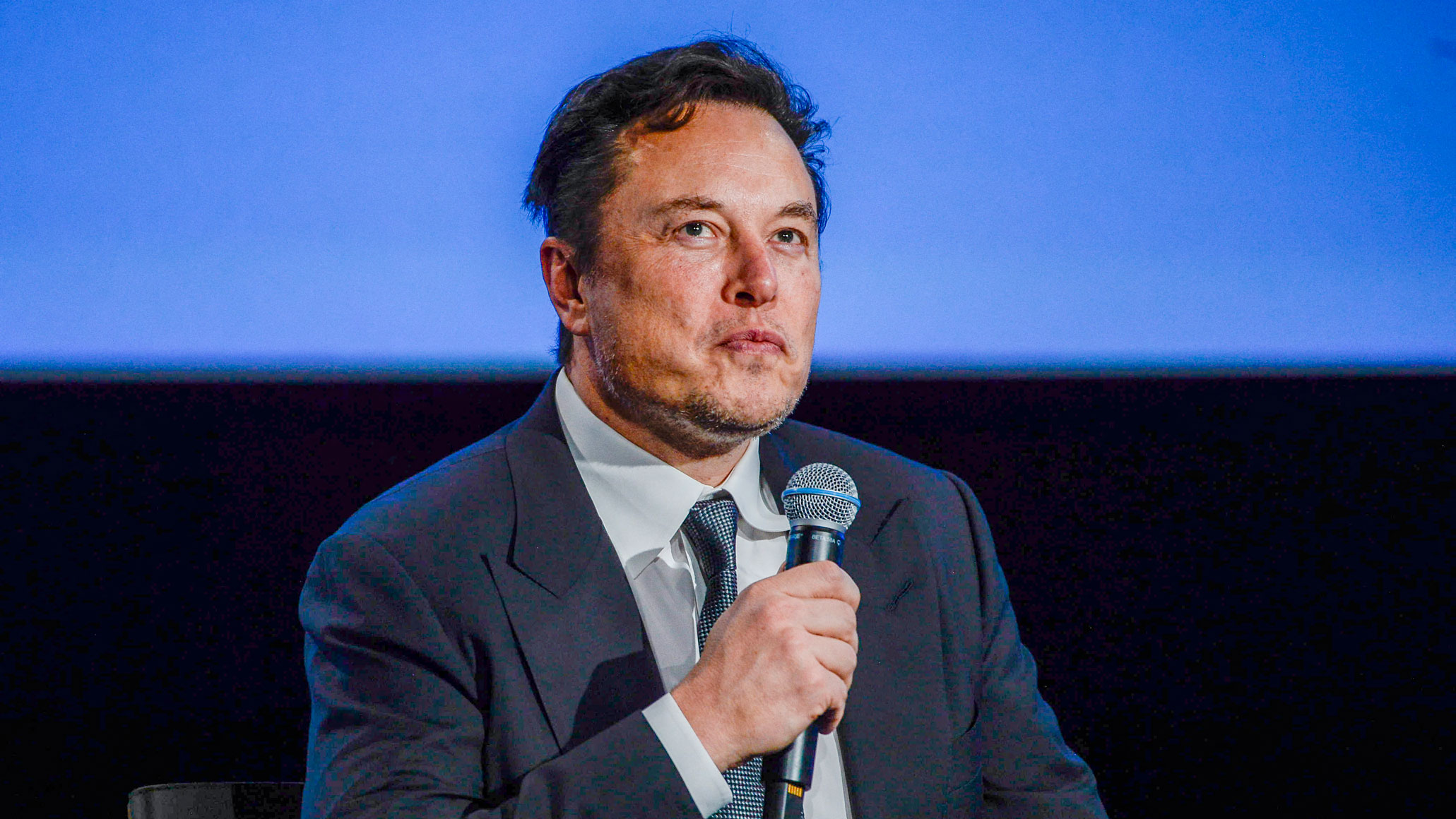 Tesla CEO Elon Musk looks up as he addresses guests at the Offshore Northern Seas 2022 (ONS) meeting in Stavanger, Norway on August 29, 2022