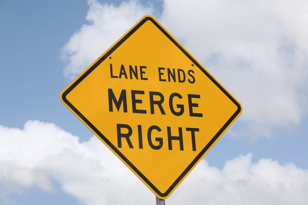 merge right road sign