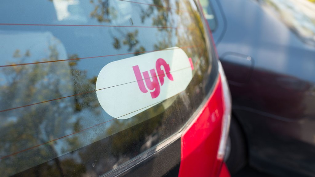 Sticker for Lyft on the back of a Lyft ride sharing vehicle in the Silicon Valley town of Santa Clara, California, August 17, 2017. (Photo via Smith Collection/Gado/Getty Images).