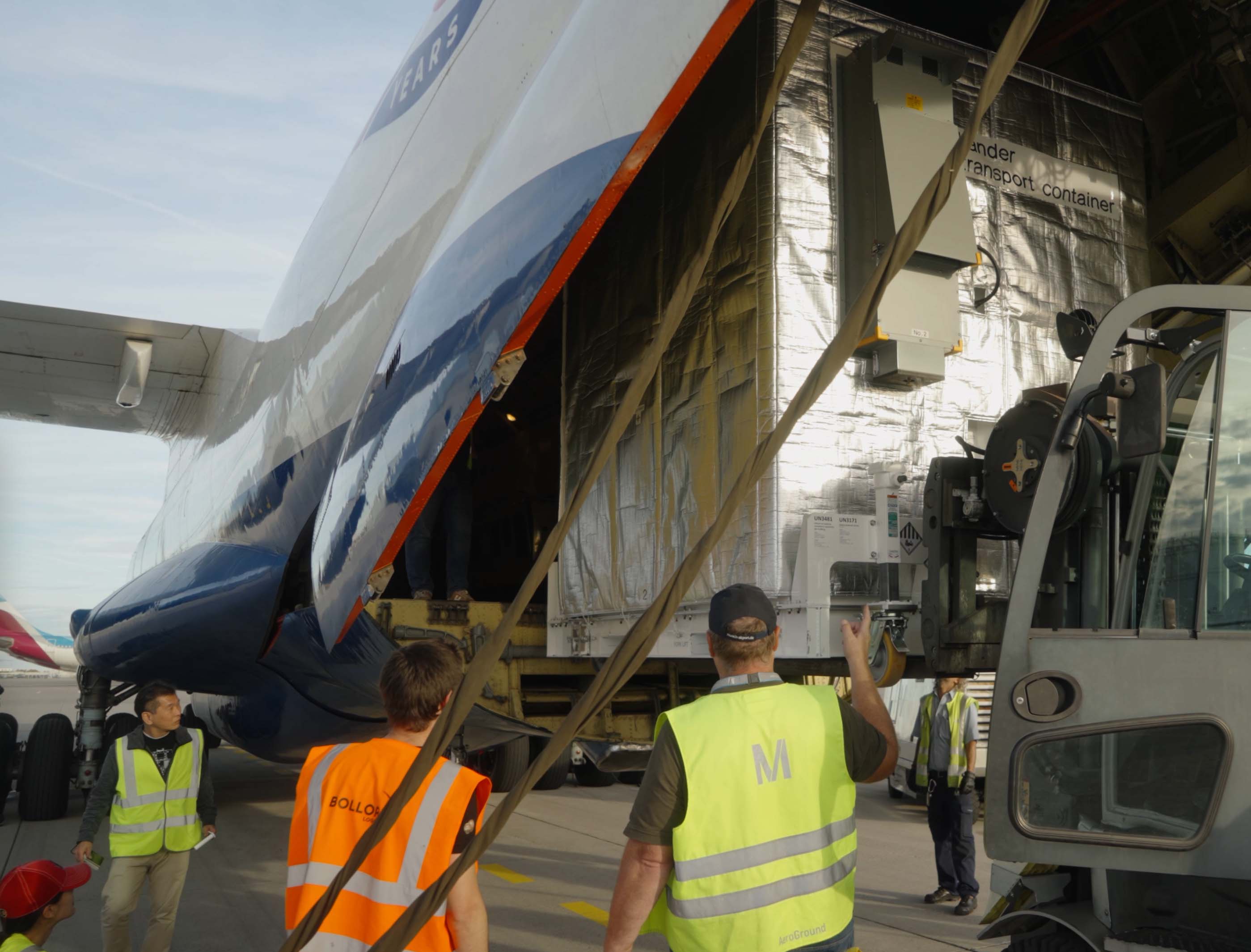 The M1 lander is loaded onto the cargo plane for transport to Cape Canaveral, Fla.