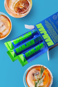 Summer International's HANJAN wellness brand, with sachets and fruit against a blue background