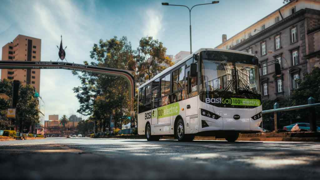 BasiGO bus driving on city street