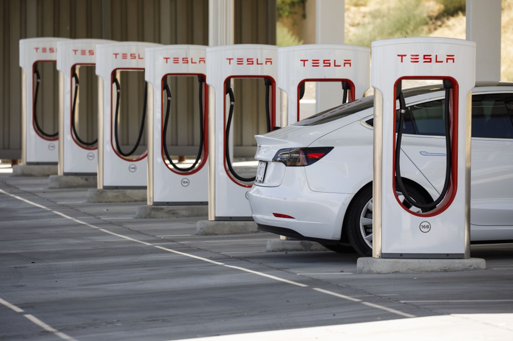 Tesla Model 3 charging at a Supercharger