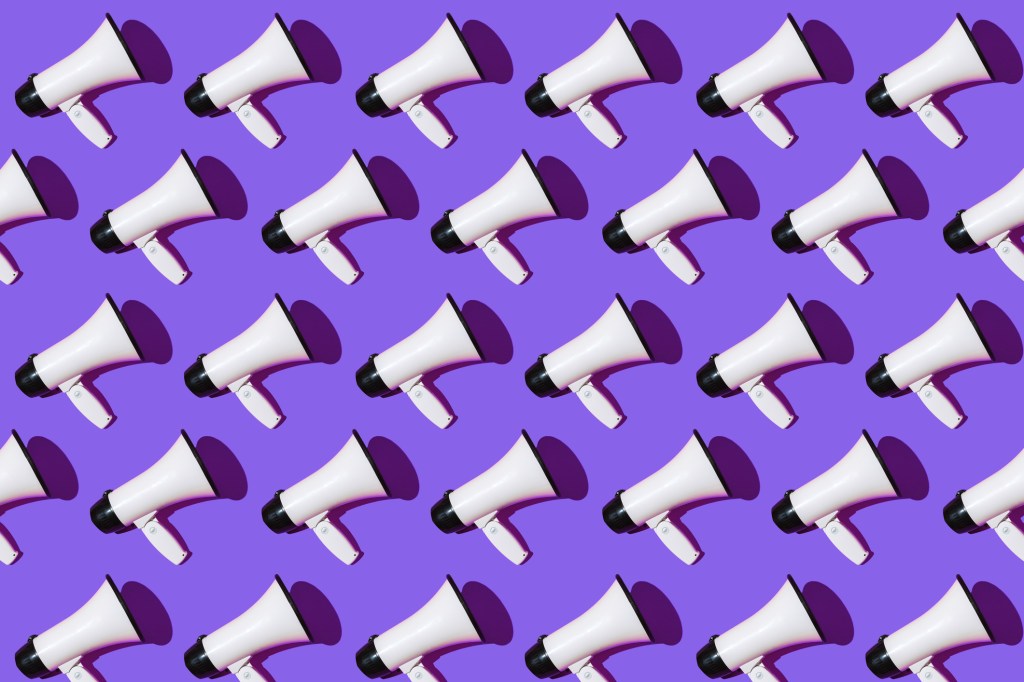 White megaphones pattern with black ornament on purple background. Shout, message, announcement and news concept.