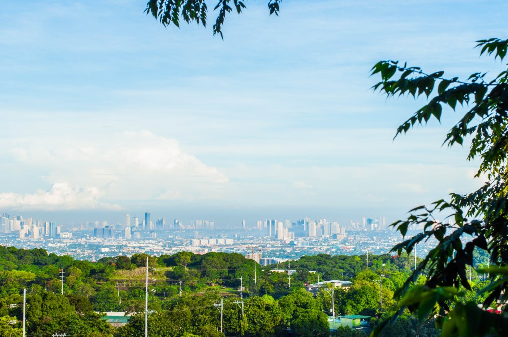 The landscape outside of Manila, with the city visible in the background