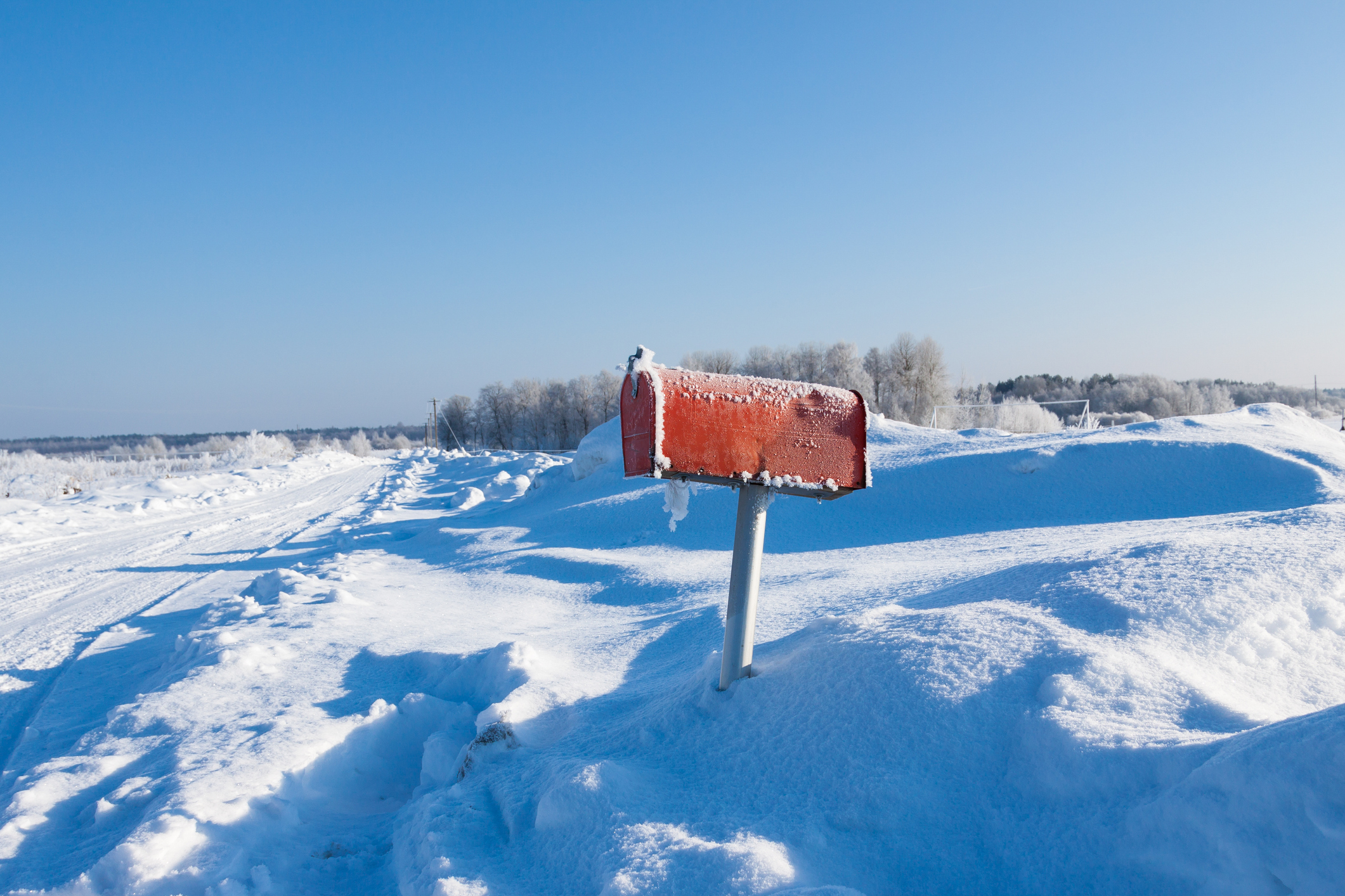 Mail box frozen in snow