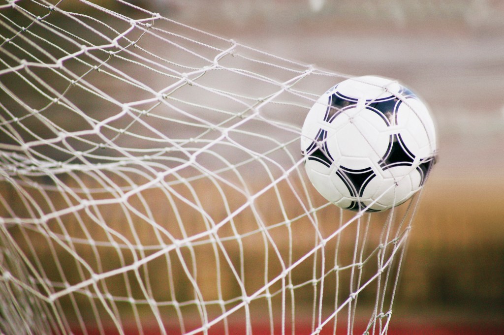Football Trapped in a Goal Net, Close-Up
