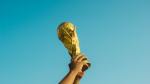 FIFA World Cup trophy held aloft