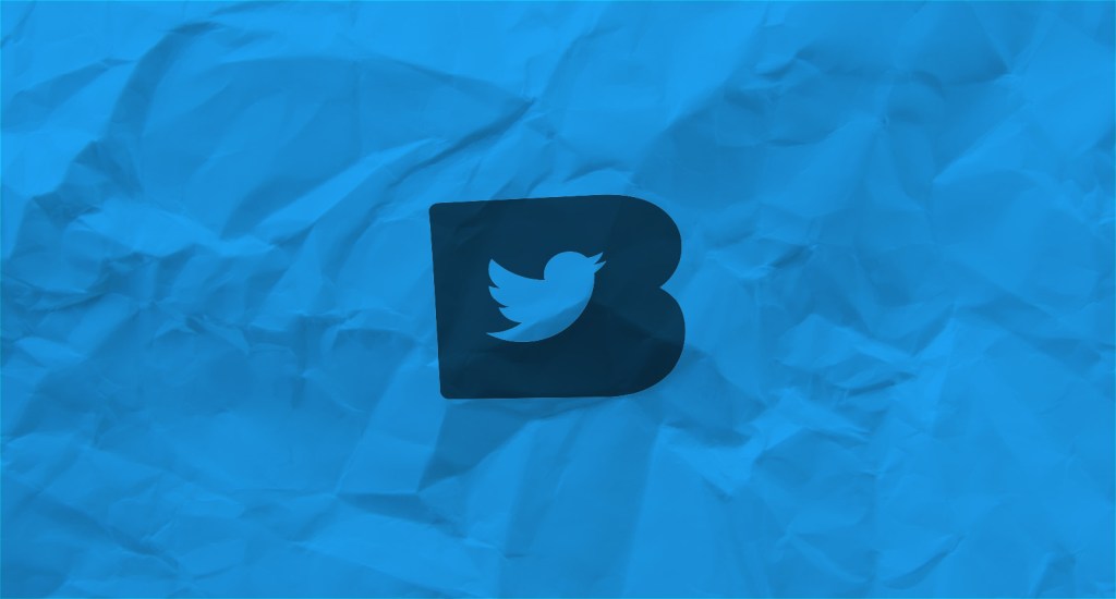 Logo Twitter albastru pe hârtie mototolită