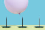 Image of a pink balloon hovering over three spikes to represent risk.