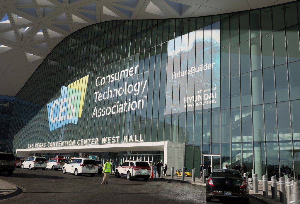 LAS VEGAS, NEVADA - JANUARY 06: Taxi cabs line up in front of the new West Hall at the Las Vegas Convention Center during CES 2022 on January 6, 2022 in Las Vegas, Nevada. CES, the world's largest annual consumer technology trade show, is being held in person through January 7, with some companies deciding to participate virtually only or canceling their attendance due to concerns over the major surge in COVID-19 cases. (Photo by Ethan Miller/Getty Images)