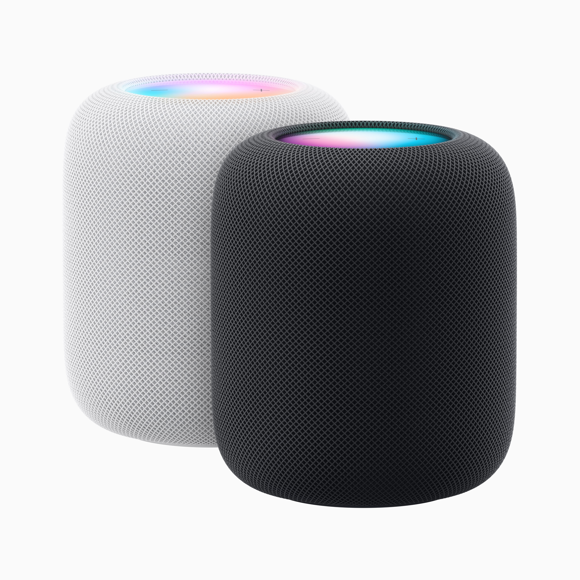 Apple HomePod smart speakers in black and white