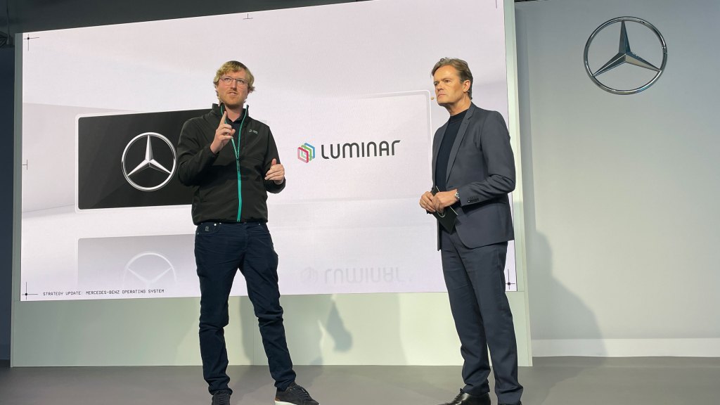 Mercedes reps onstage talking Luminar