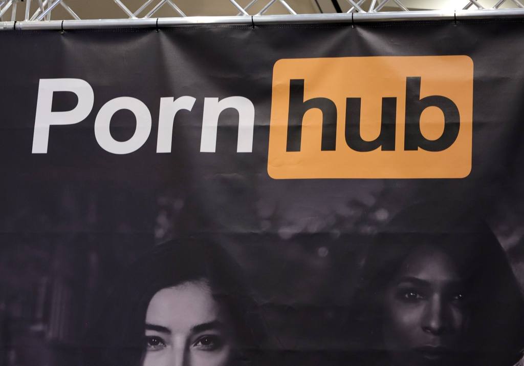 A sign hangs at the Pornhub booth at the 2023 AVN Adult Entertainment Expo at Resorts World Las Vegas on January 06, 2023 in Las Vegas, Nevada.