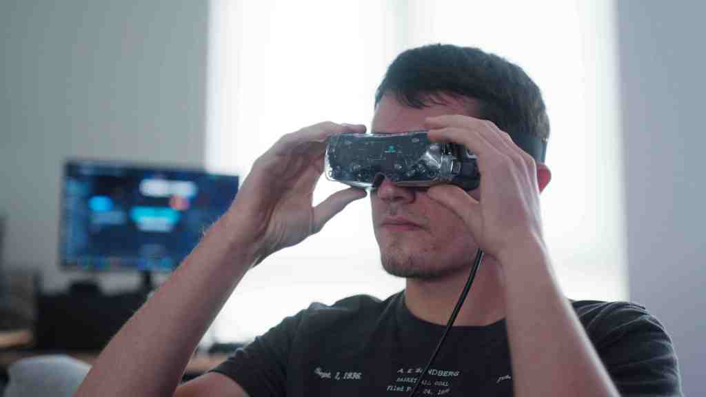 man wearing Bigscreen Beyond VR headset
