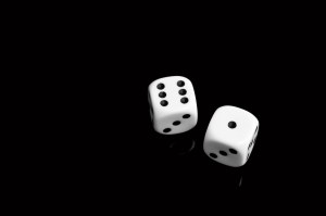 White seven dice on black background