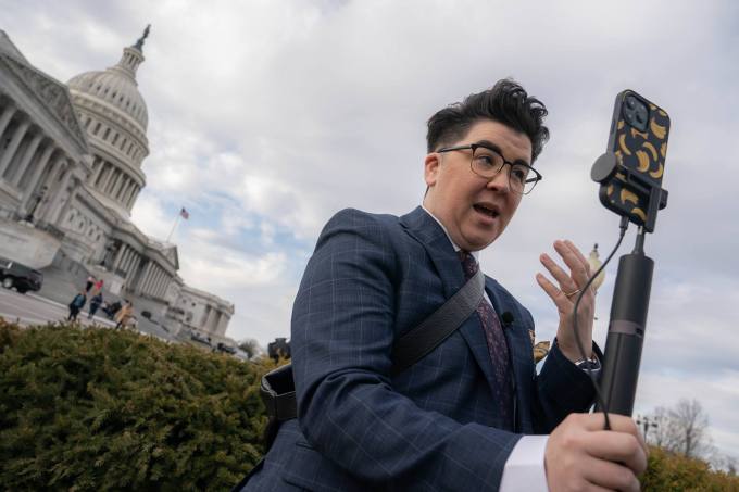 Vitus Spehar, host of the TikTok channel Under The News Desk, hosts a live stream during a news conference outside the US Capitol in Washington, DC, US, on Wednesday, March 22, 2023.