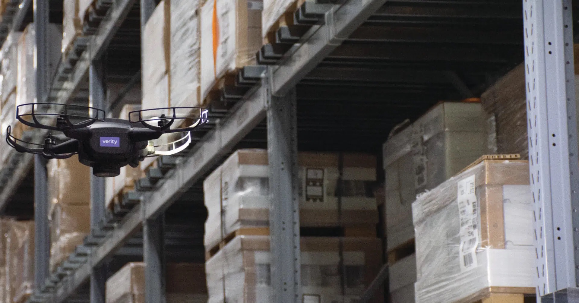 warehouse drone cruising the aisle