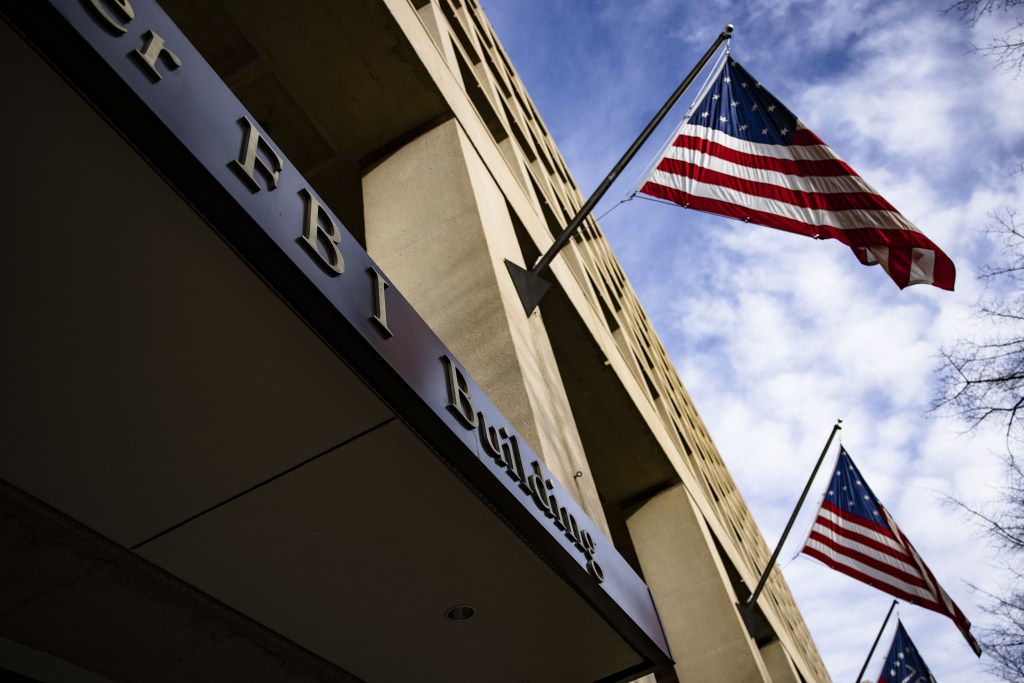 American Flags Fly Outside The Federal Bureau Of Investigation (Fbi) Headquarters In Washington, Dc.