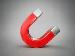 red magnet isolated on a grey background