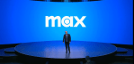 Warner Bros. Discovery; man onstage in front of MAX logo