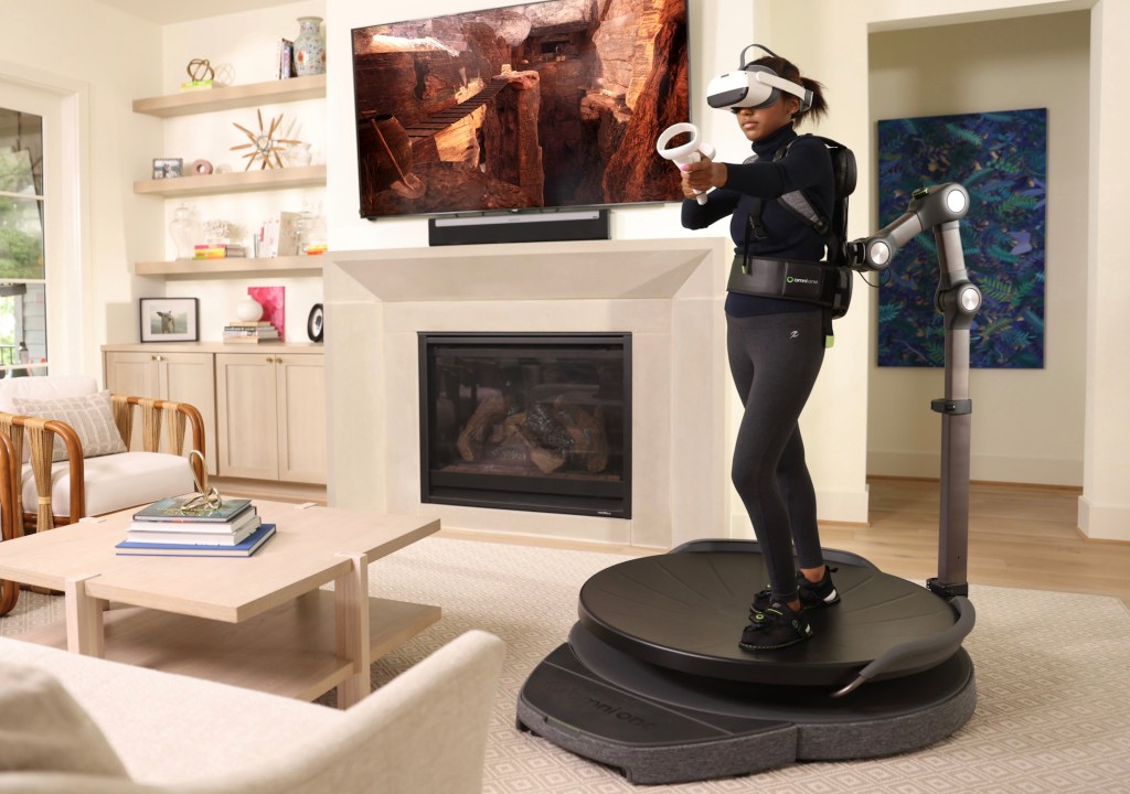 Woman using Virtuix VR treadmill