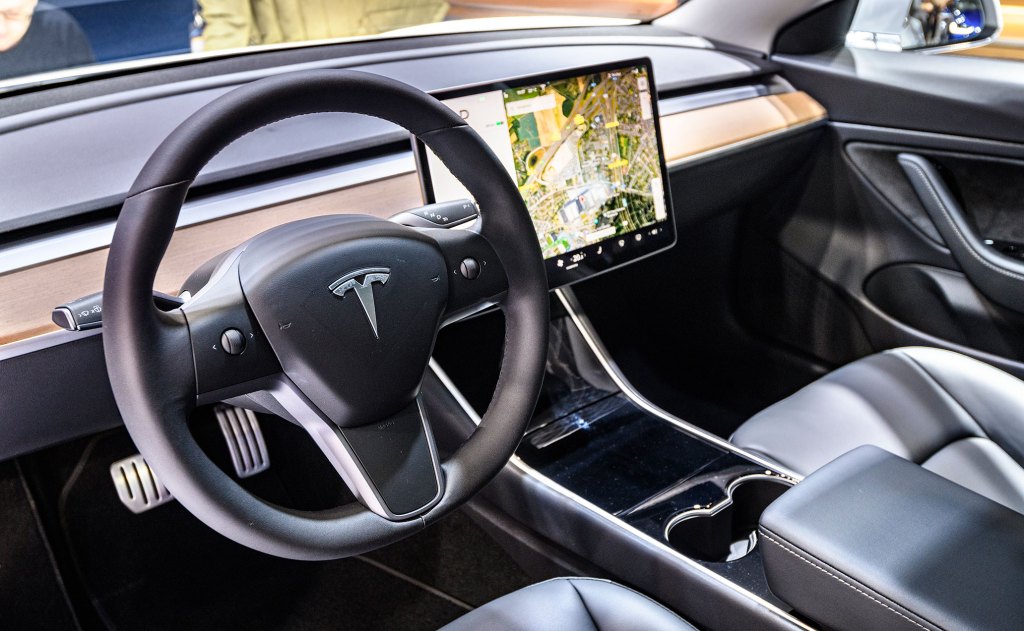 BRUSSELS, BELGIUM - JANUARY 9: Tesla Model 3 compact full electric car interior with a large touch screen on the dashboard on display at Brussels Expo on January 9, 2020 in Brussels, Belgium. The Model 3 is fitted with a full self-driving system. (Photo by Sjoerd van der Wal/Getty Images)