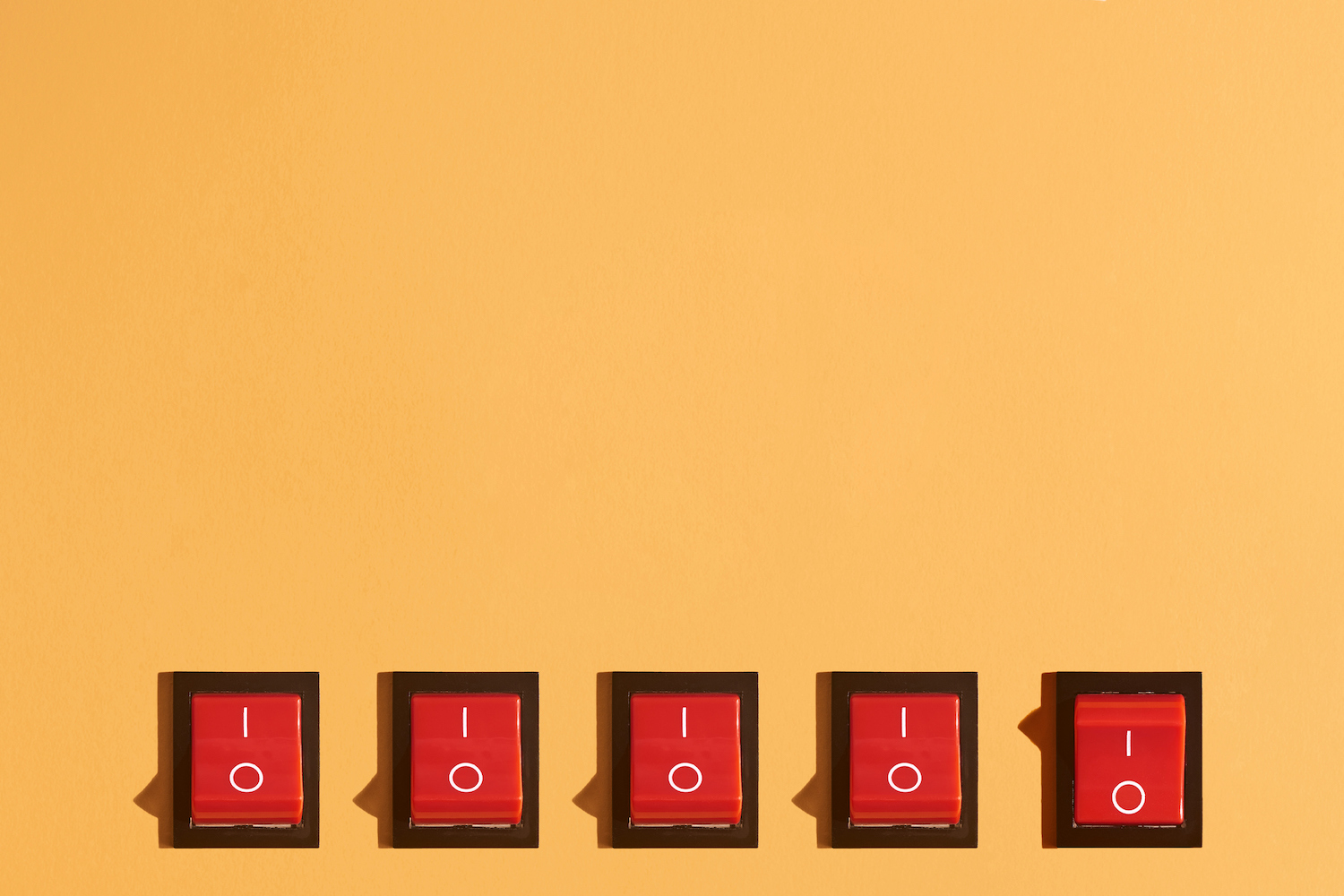Five Toggle Switches On Orange Background