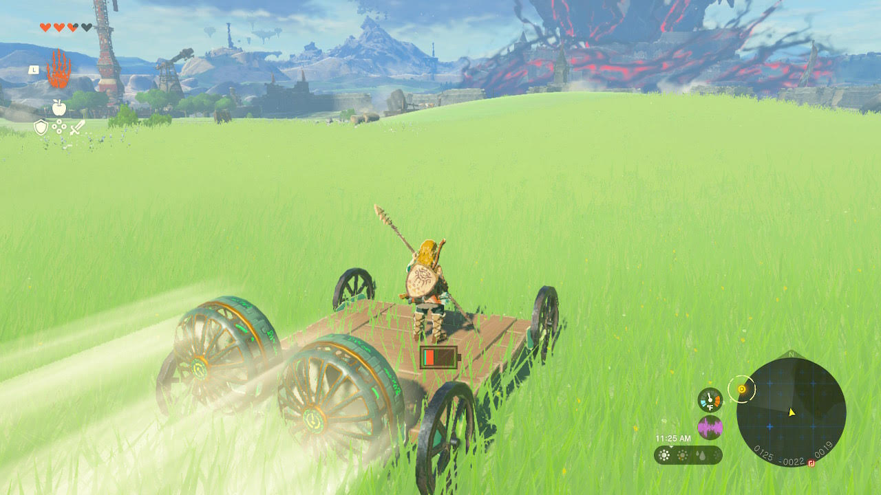 Link crosses an expanse of grass in a sketchy contraption.
