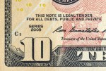 Ten American dollars close-up, details of a genuine American 10 banknote