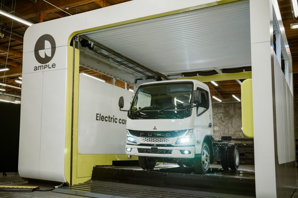 Mitsubishi Fuso eCanter electric truck in Ample's battery swapping station