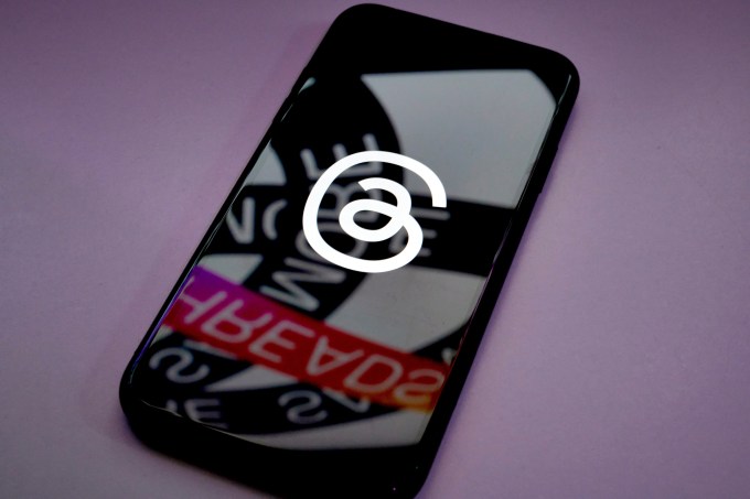 The Threads logo on a smartphone
