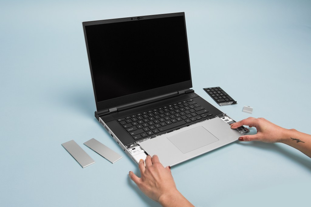 An image depicting two hands touching Framework's new Laptop 16