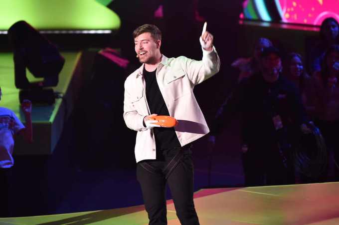 MrBeast speaks onstage during the 2023 Nickelodeon Kids' Choice Awards at Microsoft Theater in LA